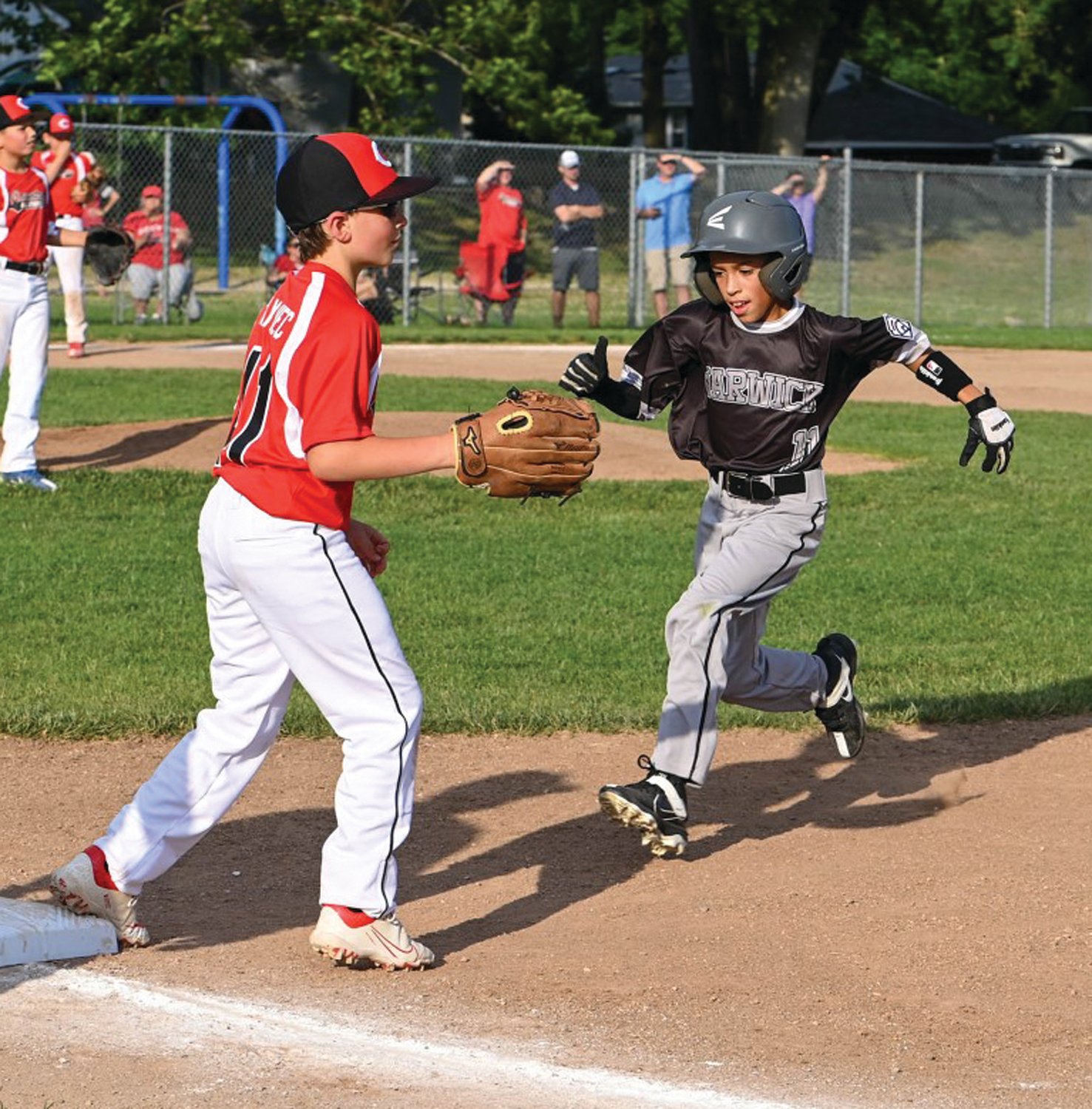 BACK TO THE BAG: North’s Steven Jerez runs back to first base while on the basepaths last week.